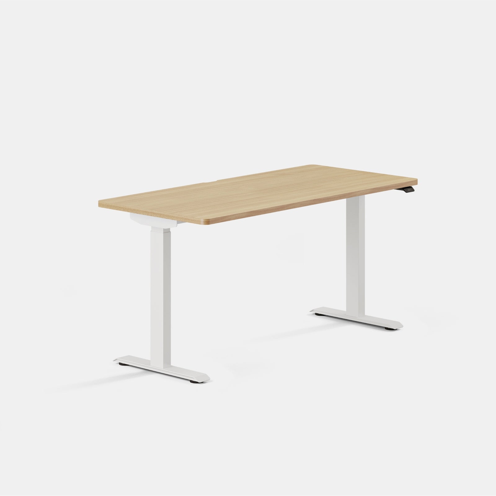 Branch Duo 58 × 27 inches adjustable desk with Woodgrain top and White legs, manufacturer product view.