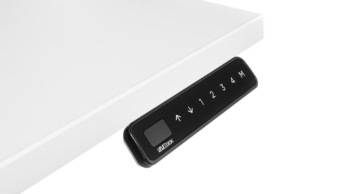 Black UPLIFT FRM066 angled keypad mounted beneath a light desktop; the selected complete desk is not pictured