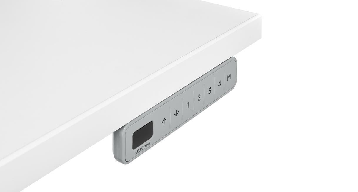 Gray UPLIFT FRM703 flush keypad under a light desktop; keypad option only, not the complete selected black desk