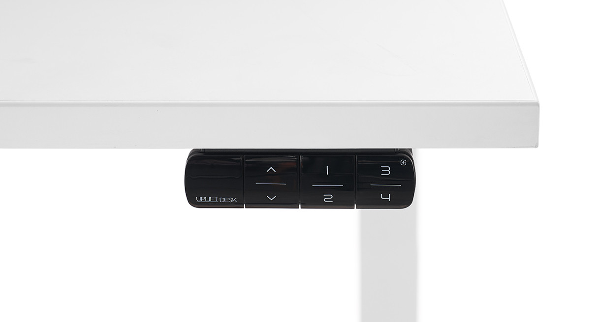 Black UPLIFT FRM715 USB keypad mounted beneath a light desktop; component only, not the selected complete desk