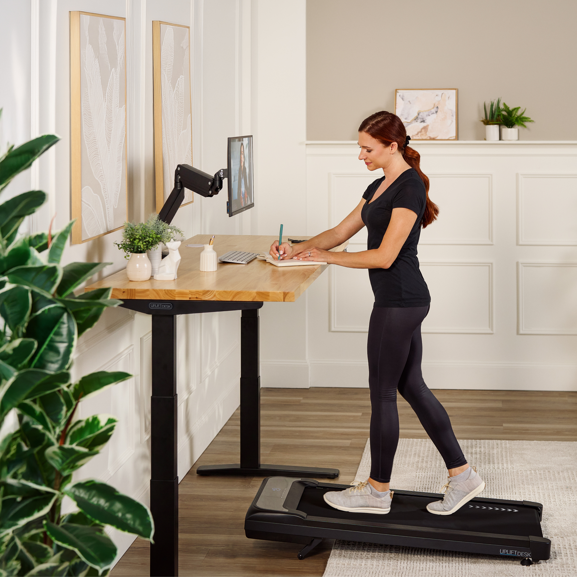 Official UPLIFT UPL964 Treadmill Desk listing image showing a black frame with the MVT011 walking pad; the selected desktop size and surface are not identified