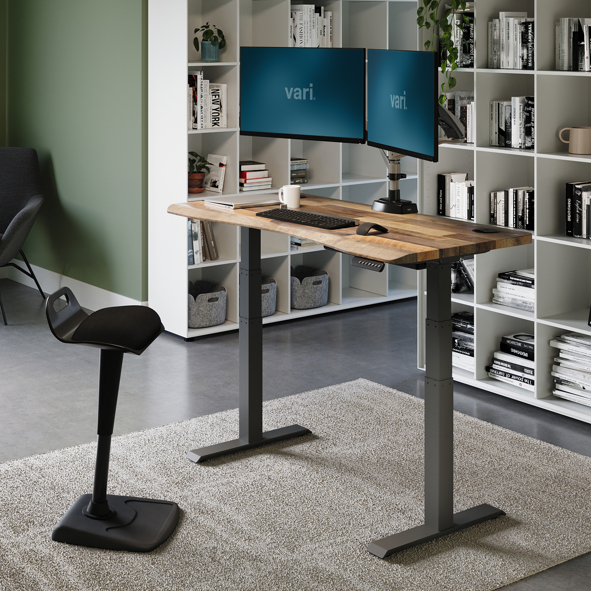 Vari Ergo Electric Standing Desk 54x26 in Reclaimed Wood/Slate finish, with a rounded laminate surface and two T-style legs