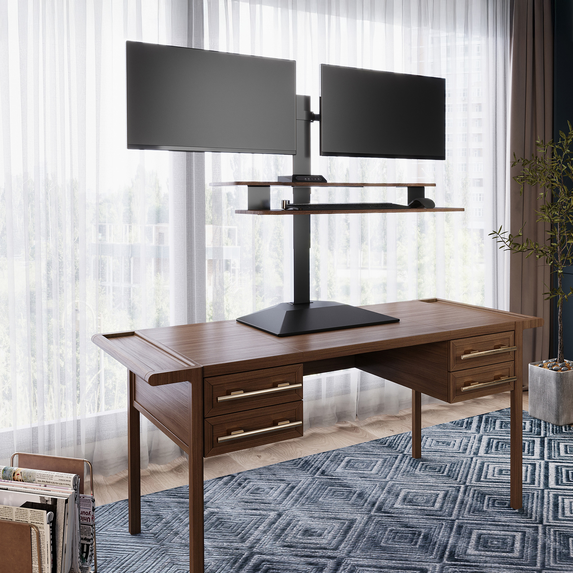 VariDesk Premier Electric Dual-Monitor Series 2 in Walnut finish raised on a separate host desk with two screens